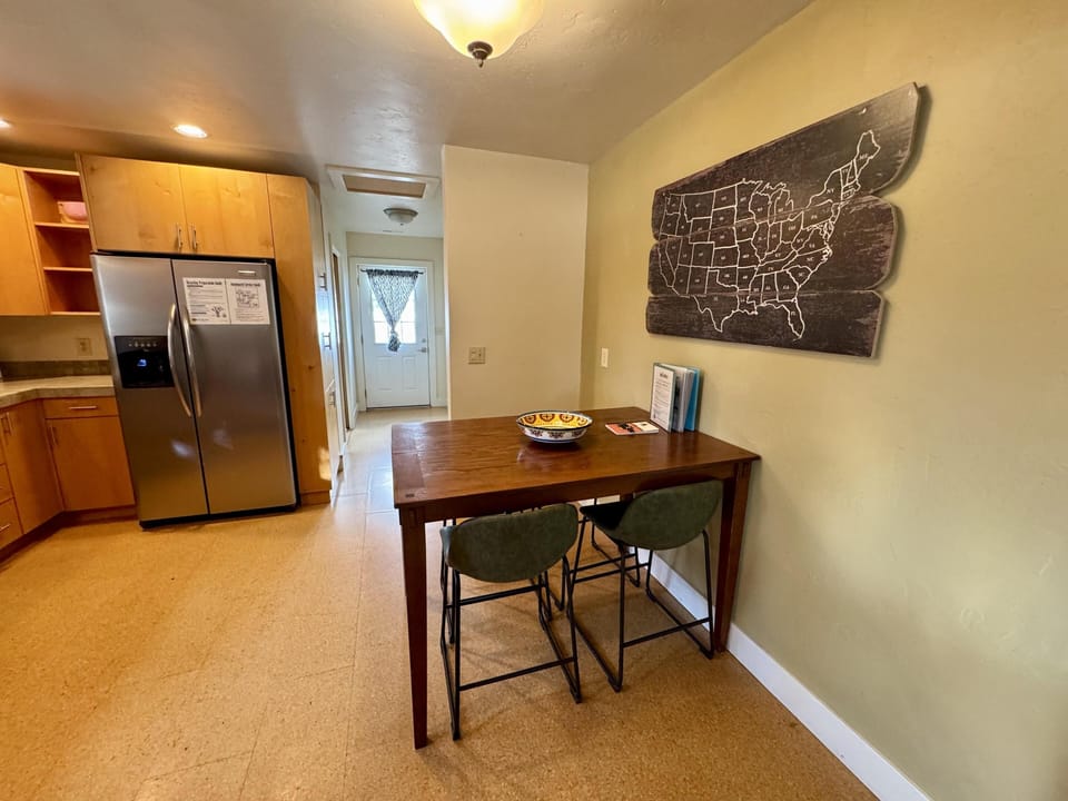 Dining and kitchen flow easily from the living space