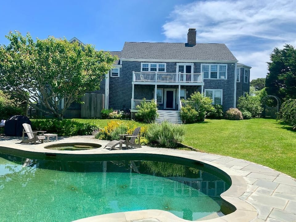 Backyard with pool, spa, and pool house! 