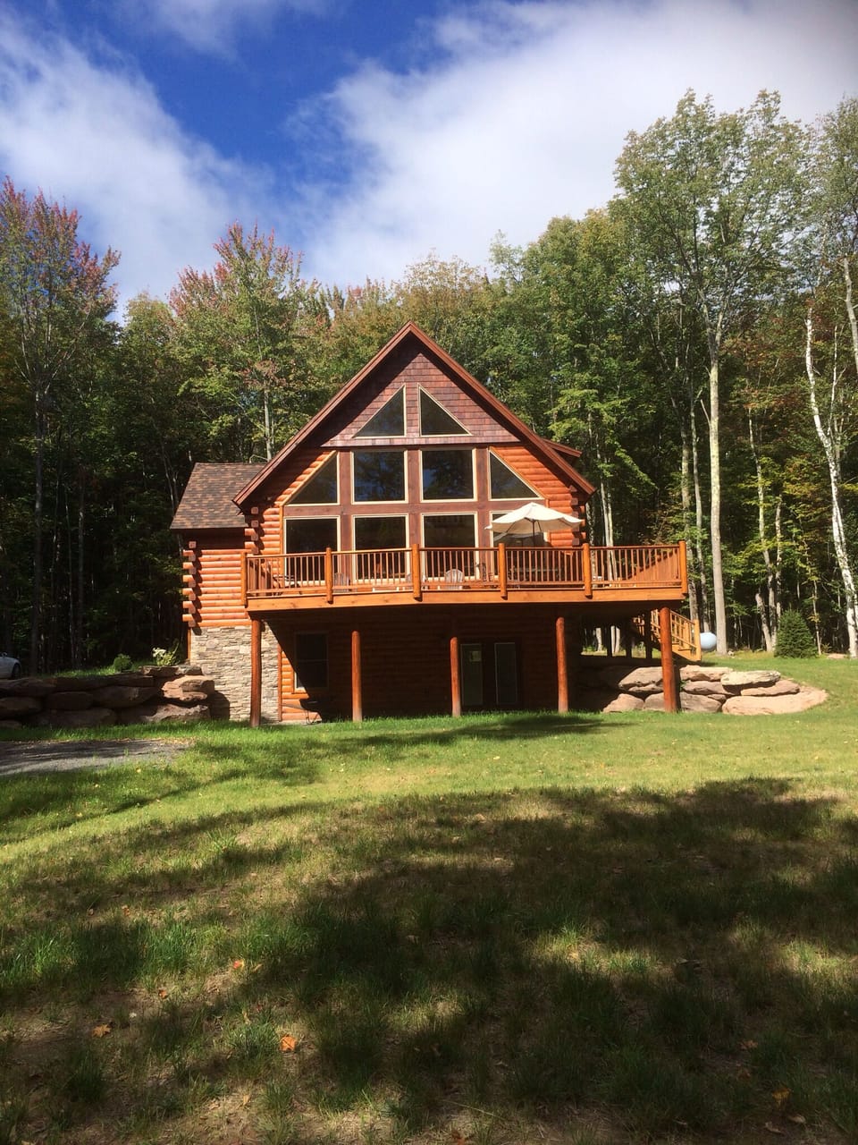 Front house showing wrap around patio