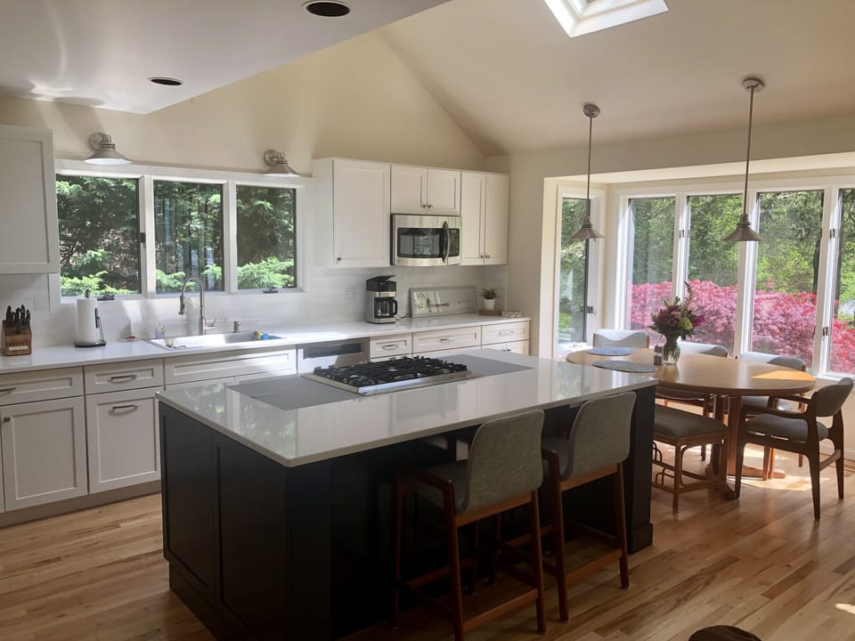 Newly renovated eat-in kitchen.  New island gas cooktop.