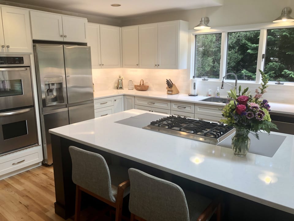 Newly renovated eat-in kitchen.  New island gas cooktop.