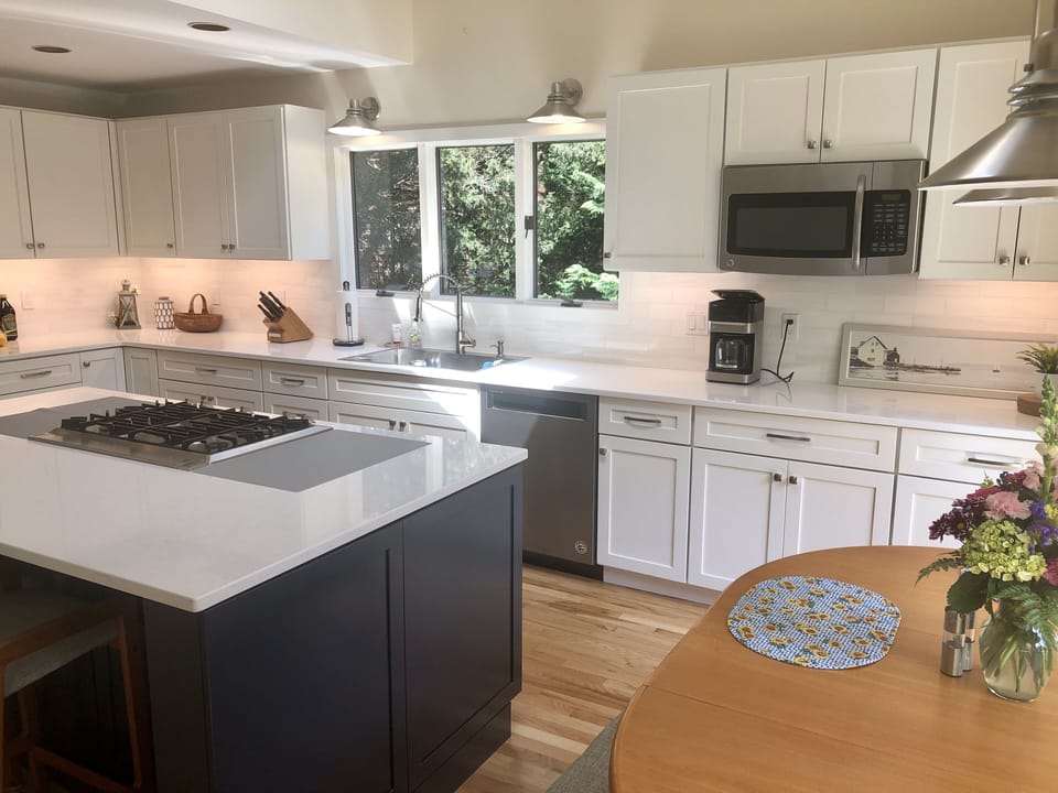 Newly renovated eat-in kitchen.  New island gas cooktop.