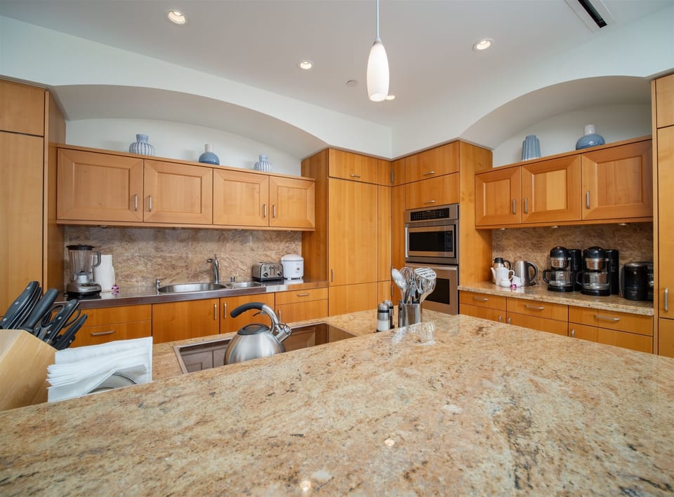 Expansive Kitchen and Dining Area with Abundant Top Quality Supplies