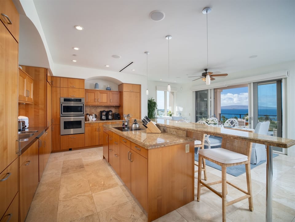 Expansive Kitchen and Dining Area with Abundant Top Quality Supplies
