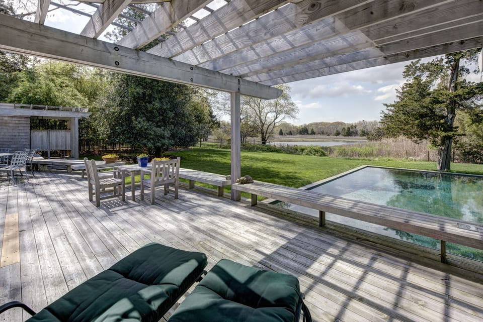 Enjoy total privacy from back deck with view of pond.