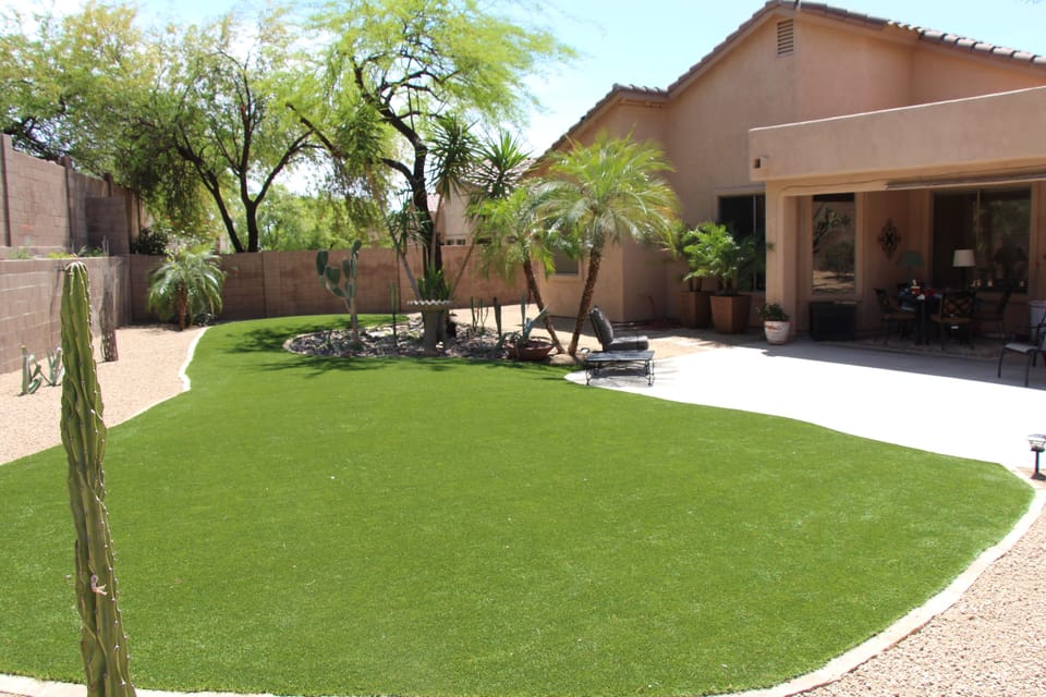 professionally landscaped with imitation lawn - Always Green!  
