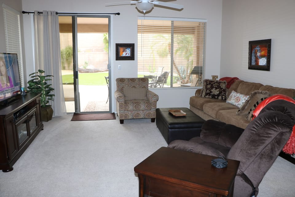 Family room with sliding door access to very private yard.