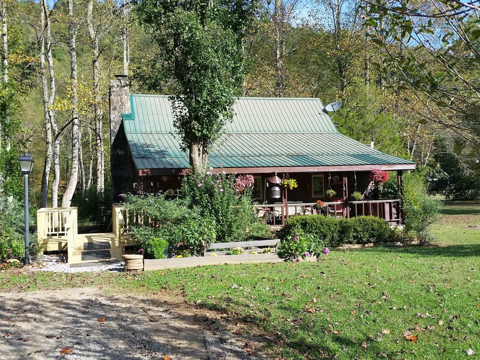 Now the cabin is handicapped accessible with  entry ramp and extension of porch