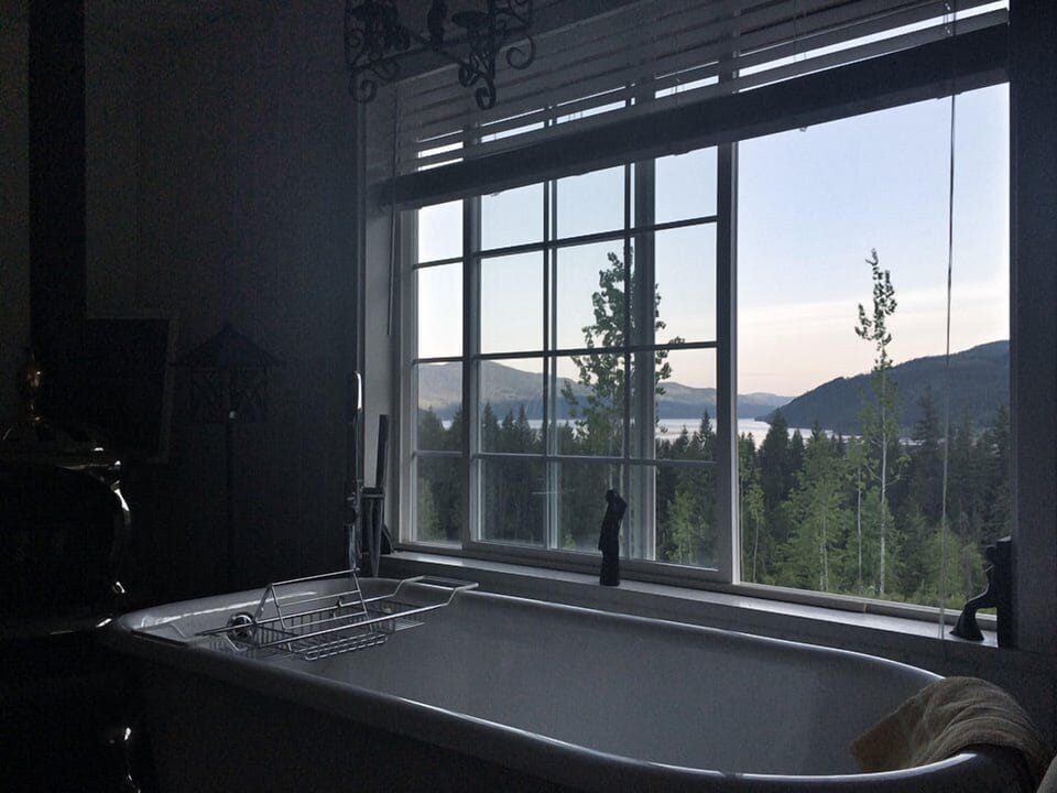 Claw-foot tub with view down the laske