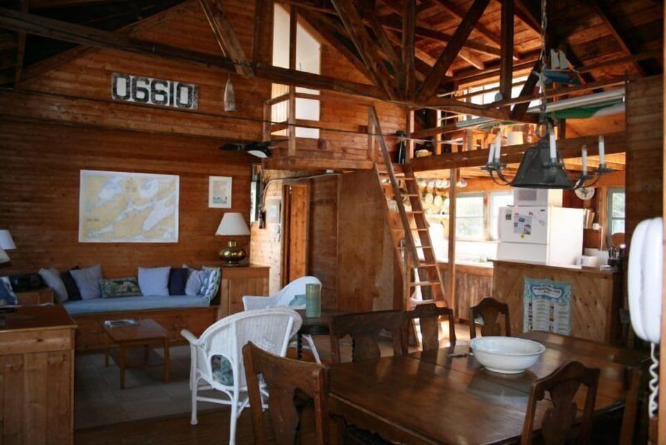 Open Interior Living Area- View of Step Ladder to Loft Bedroom