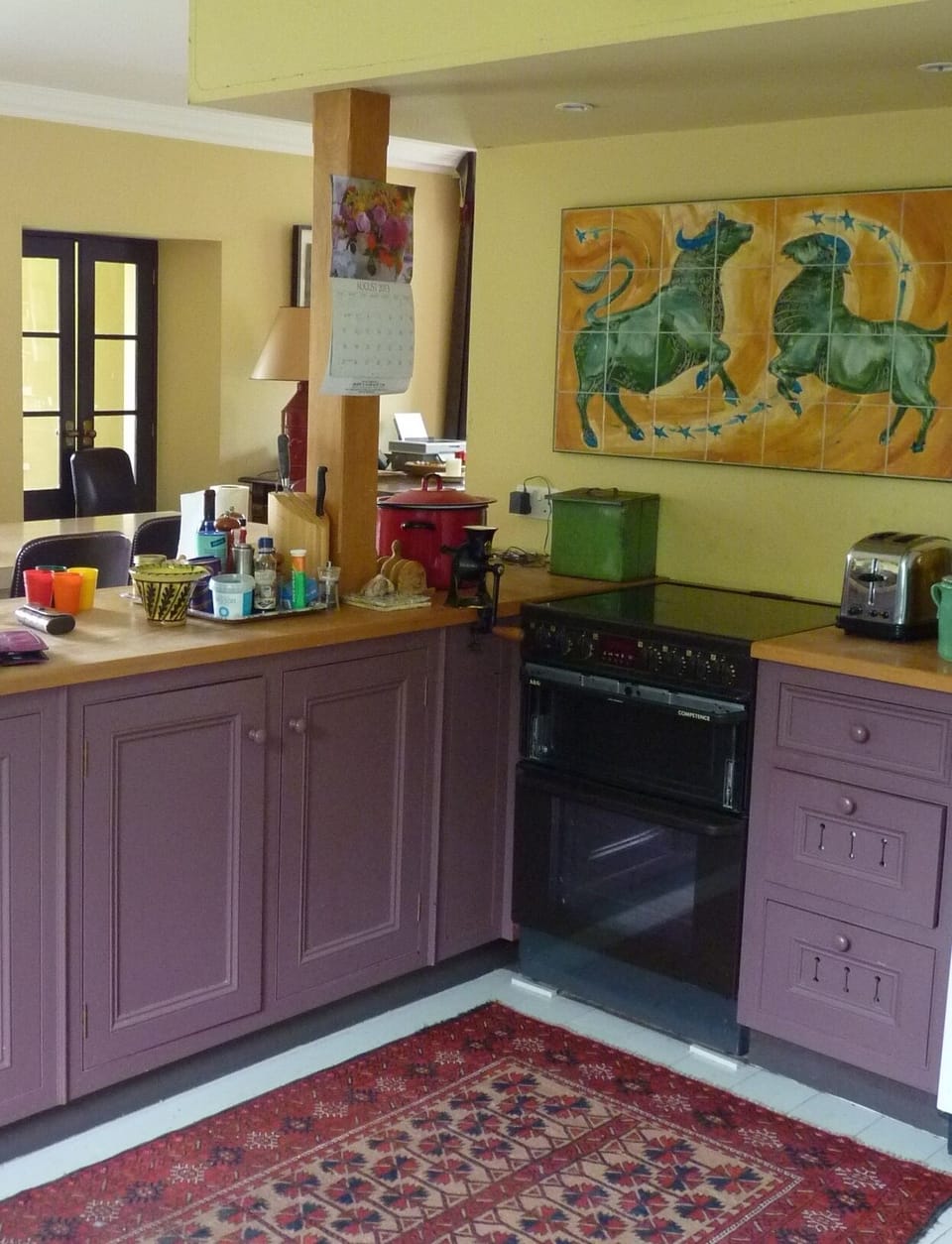 Handmade tiles decorate the kitchen