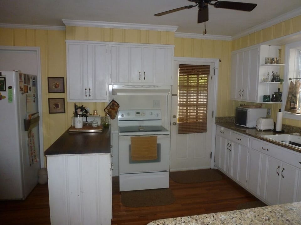 Kitchen leads out into carport