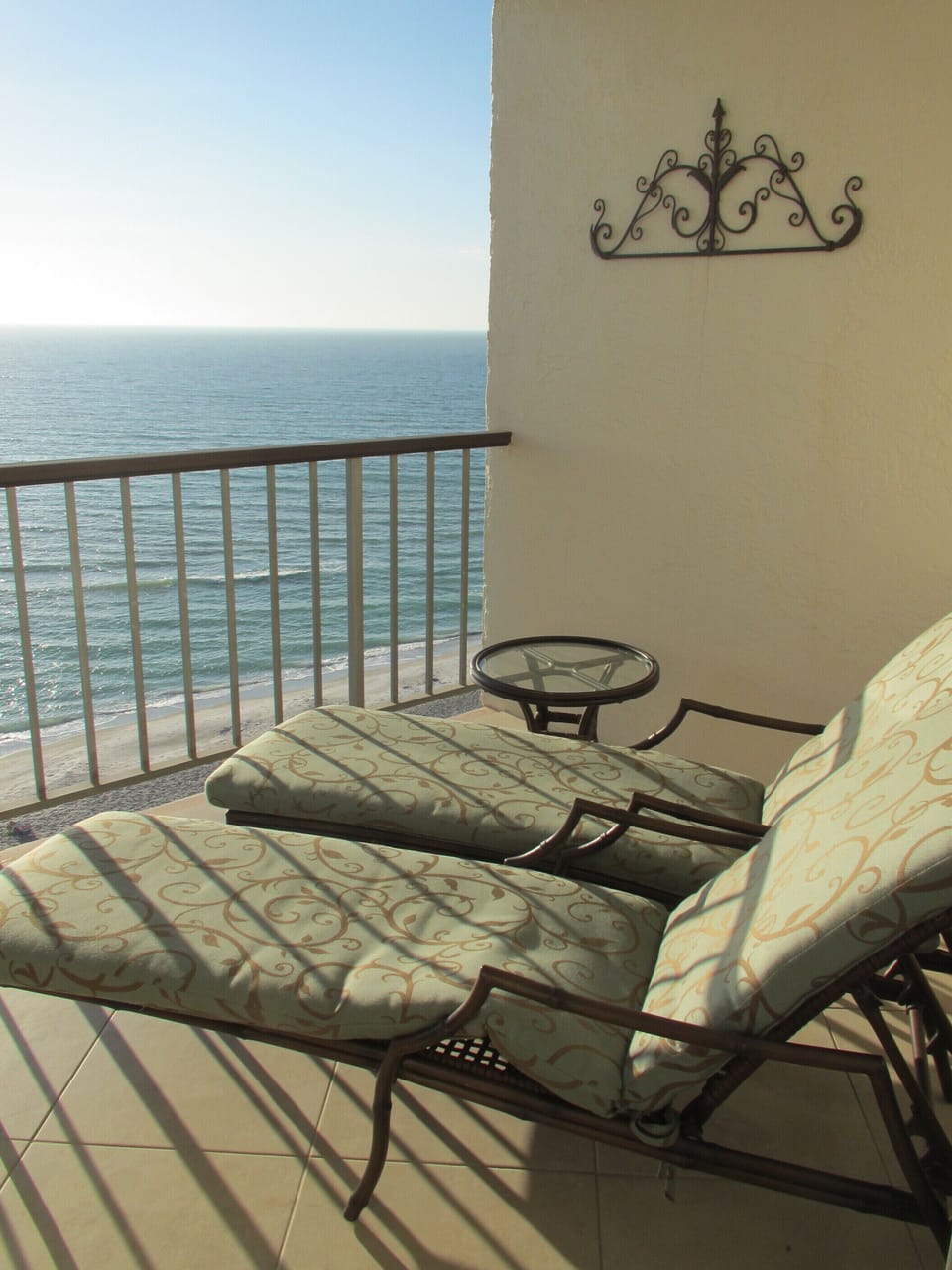 The comfortable balcony offers a spectacular view of the sunsets over the Gulf.