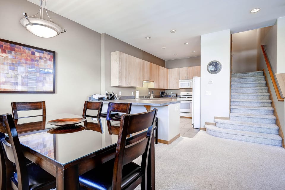 Dining room and kitchen (old countertops and appliances shown)