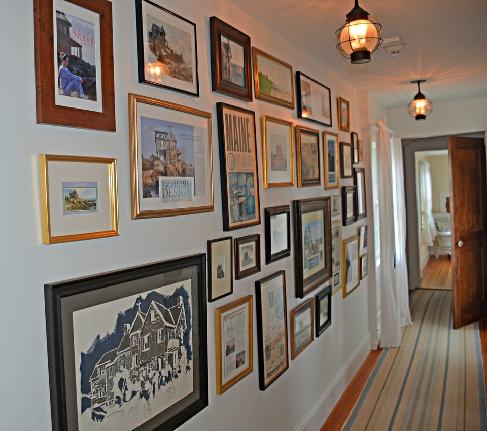 2nd Floor hallway with gallery of historic Stonehouse photos & articles.