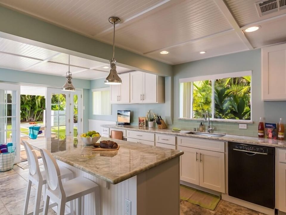 Enjoy cooking in this bright and open kitchen with scenic views.
