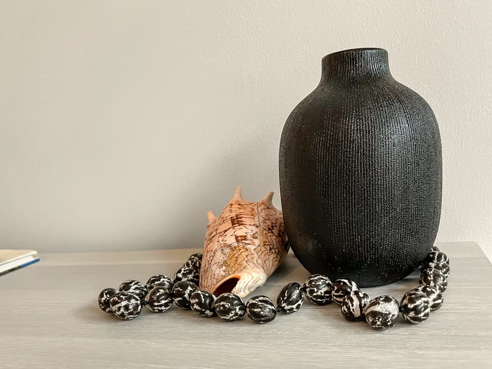 Stylish decor details bring a coastal touch to this inviting space.