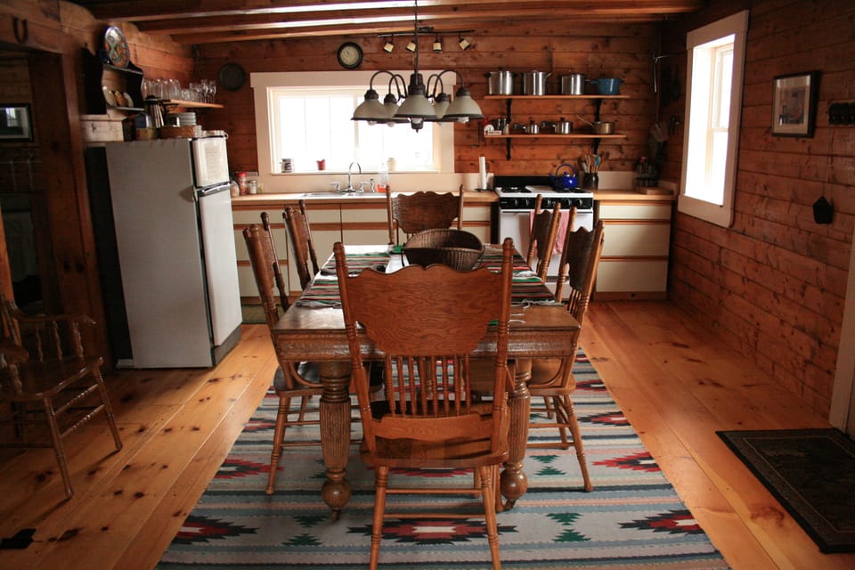 Dining room table and kitchen