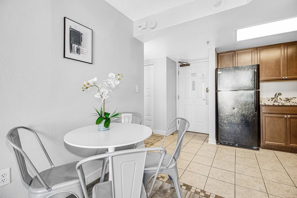 Immerse yourself in open-concept living, where the living area seamlessly transitions into the dining space, creating a spacious and welcoming environment for both relaxation and entertaining.