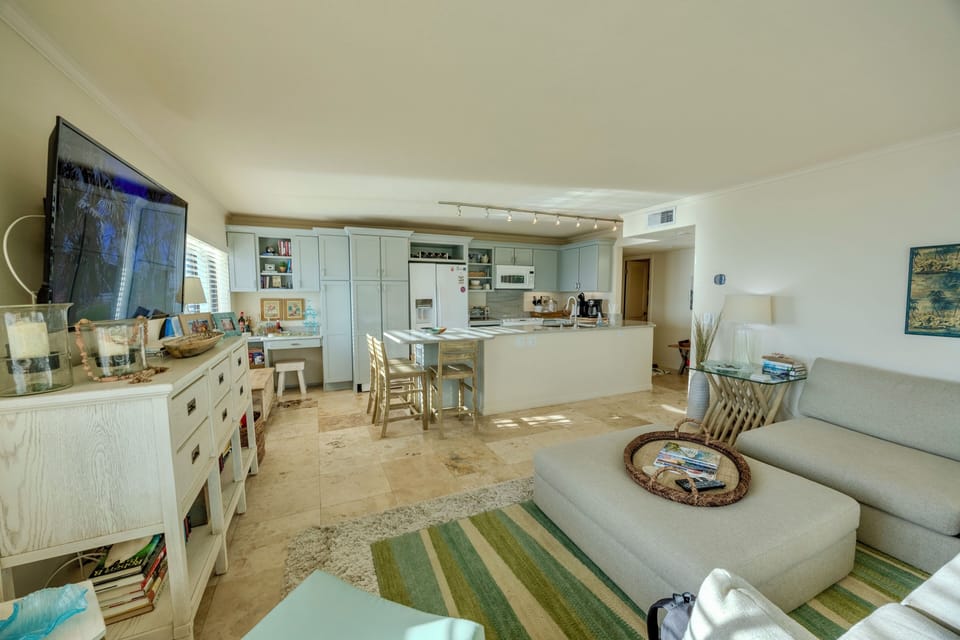 Open area living/kitchen with comfy sectional