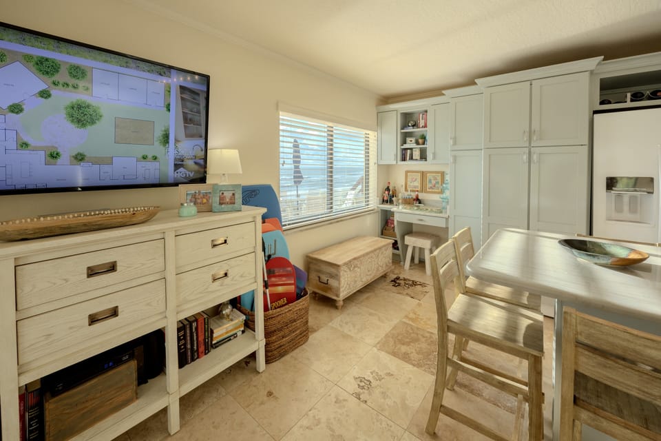 Washer/dryer in the cabinet next to fridge
