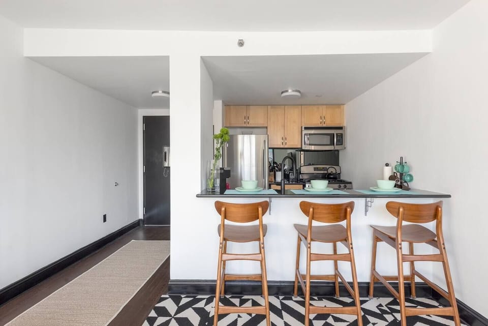 Black marble countertop dining for three. 