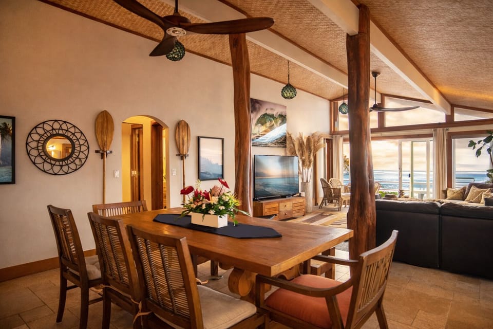 Open living and dining with ocean views and indoor-outdoor flow.
