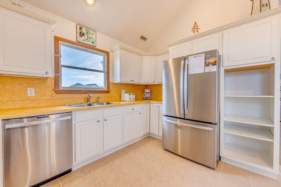 Planning and creating your favorite vacation-fresh delicacies are a breeze in this impressive kitchen.