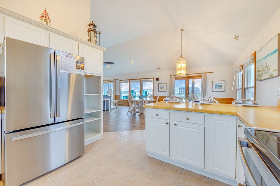 You won't miss a moment of the action — even while whipping up a snack for the crew — thanks to the open layout.