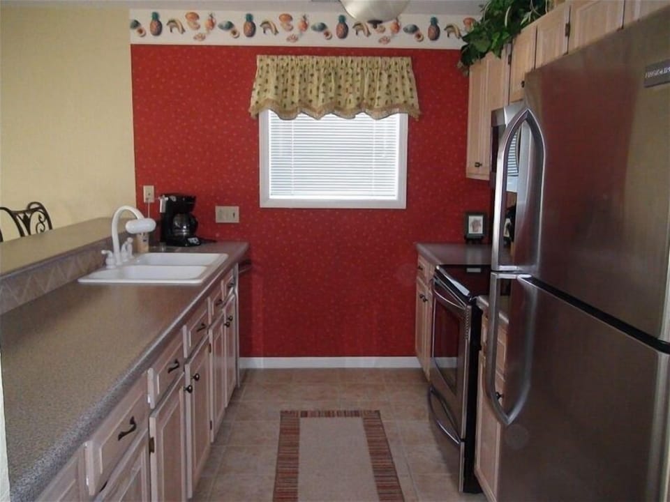 Kitchen with stainless steel appliances.