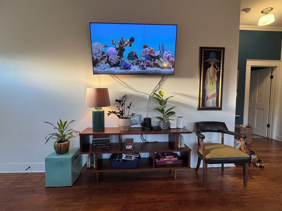 Guests enjoy a small selection of books, toys & games as well as a 65" 4K TV