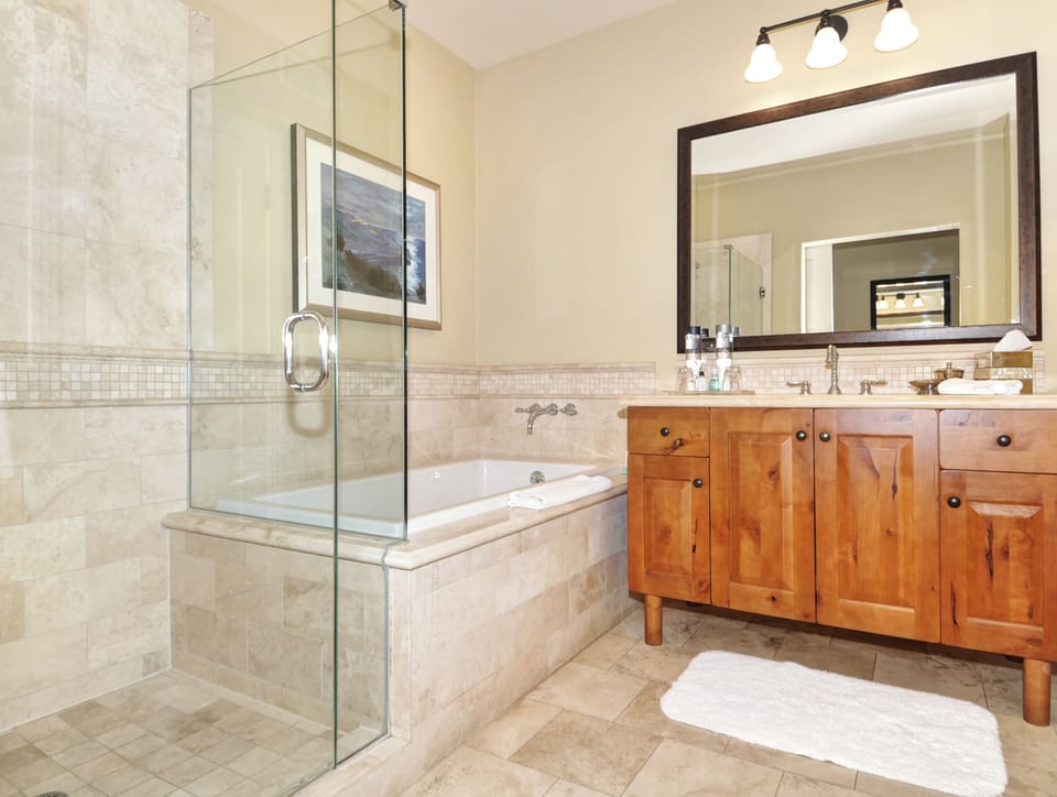 Luxury Stone Bathroom with Deep Soaking Tub and Walkin Shower