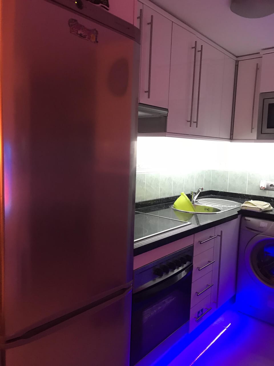 Kitchen of an evening with led lighting 