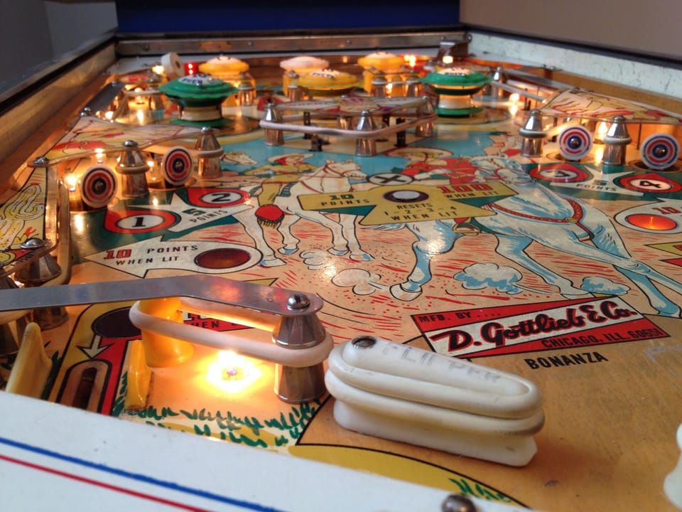 The 1964 pinball table in our basement playroom. Can you beat the high score?