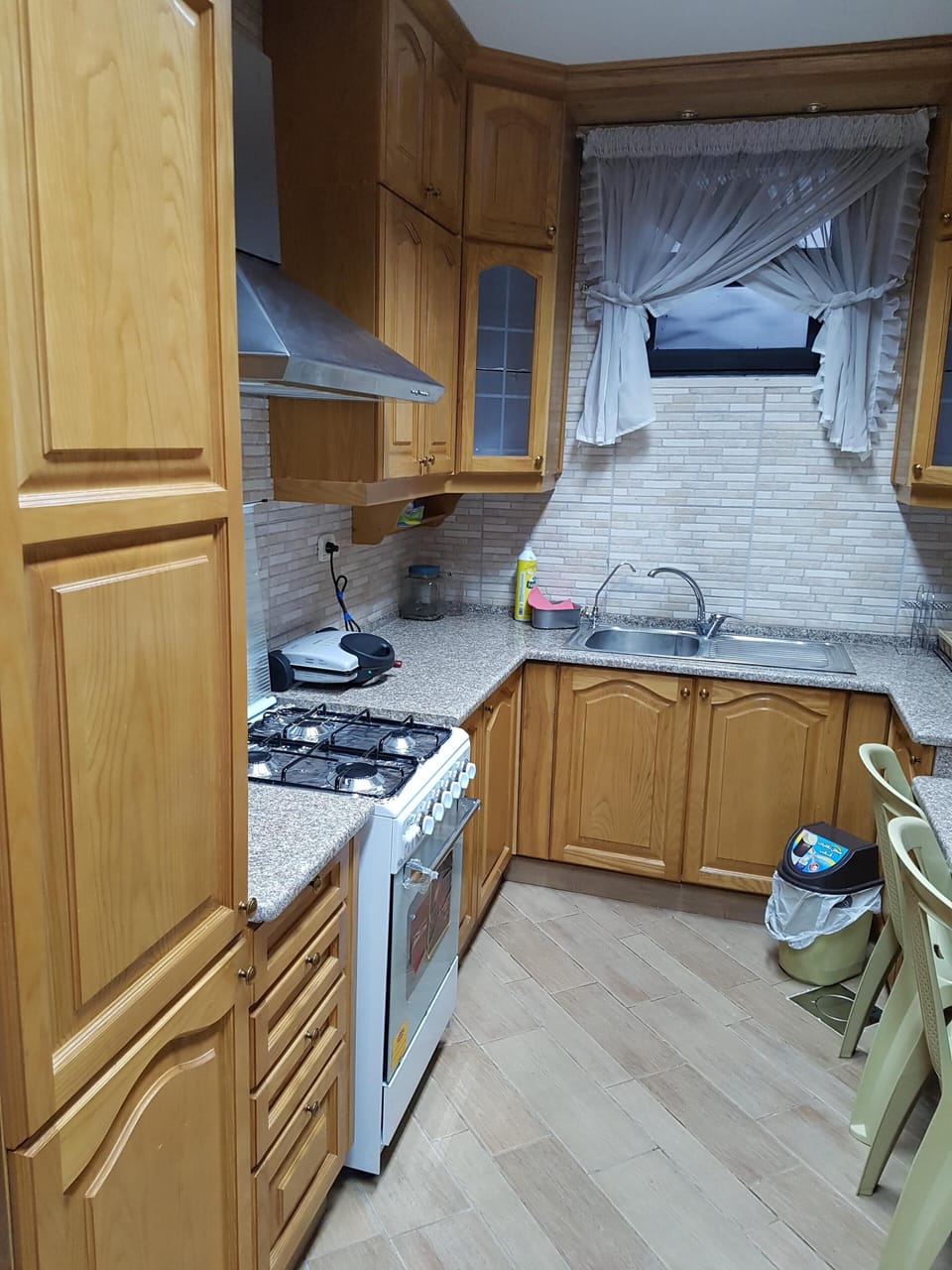 Grill and stove with oven in the kitchen 