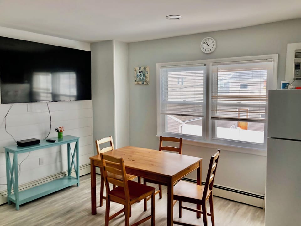 Dining area in front of cable TV