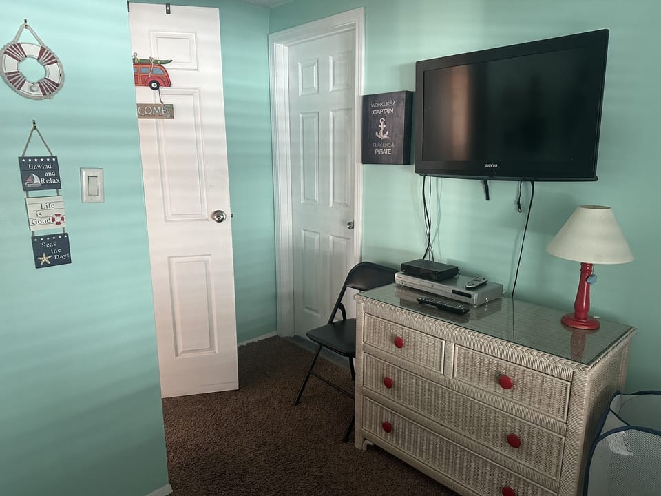 TV and storage in bunk bed room.