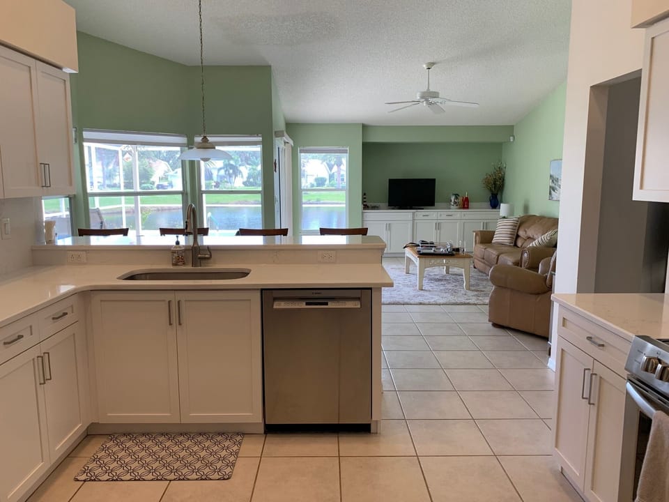 Updated kitchen with quartz counters and new appliances.
