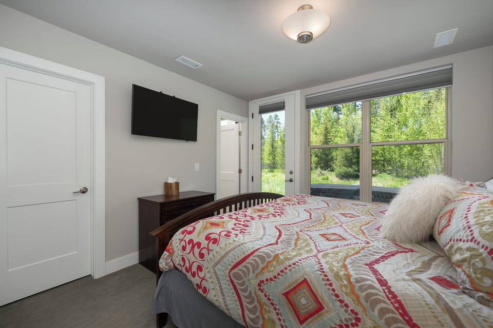 Warm, snug bedding and pillows with a lovely view. 