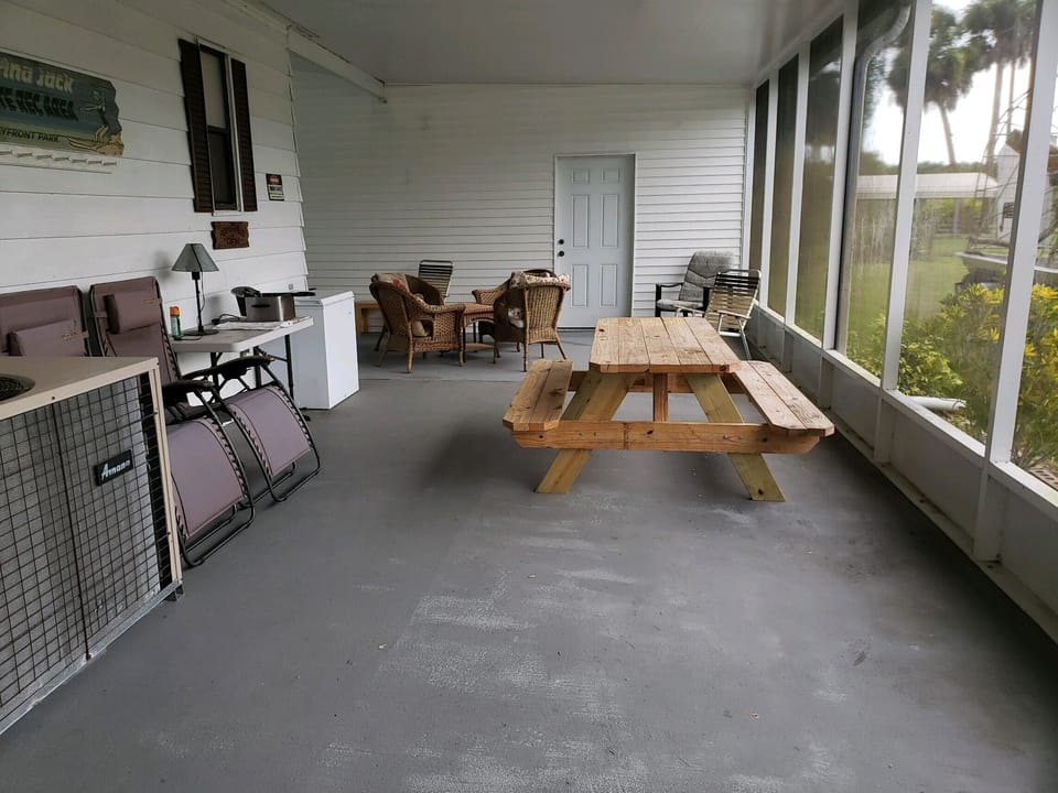 large screened porch for cookout and lots of outdoor seating