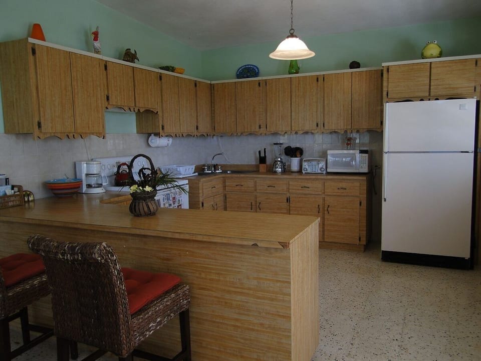 Large kitchen with pots and pans and all the necessities