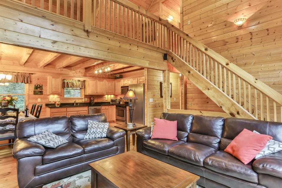 New Leather couches, stacked stone fireplace, flat screen tv, great river view