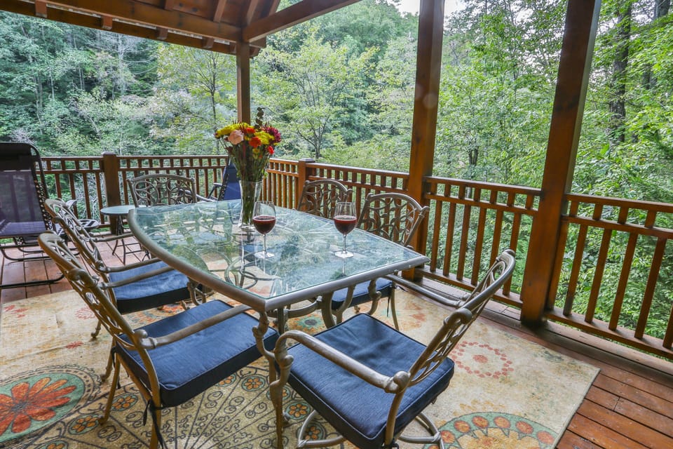 Outdoor dining and sitting area off Patio overlooking the river