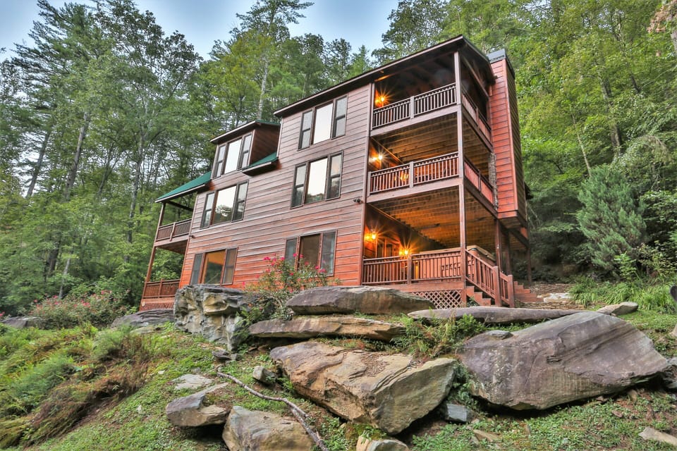 Large Waterfront lodge just steps from the river. Big Porches on every level.