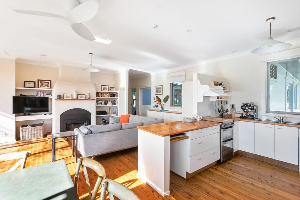 Open Plan Living.  Wood Fire, Air Con.  Fully Equipped Kitchen