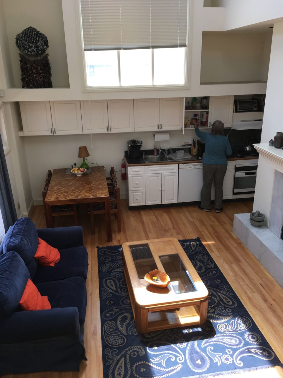 View from sleeping loft down to living room/kitchen area