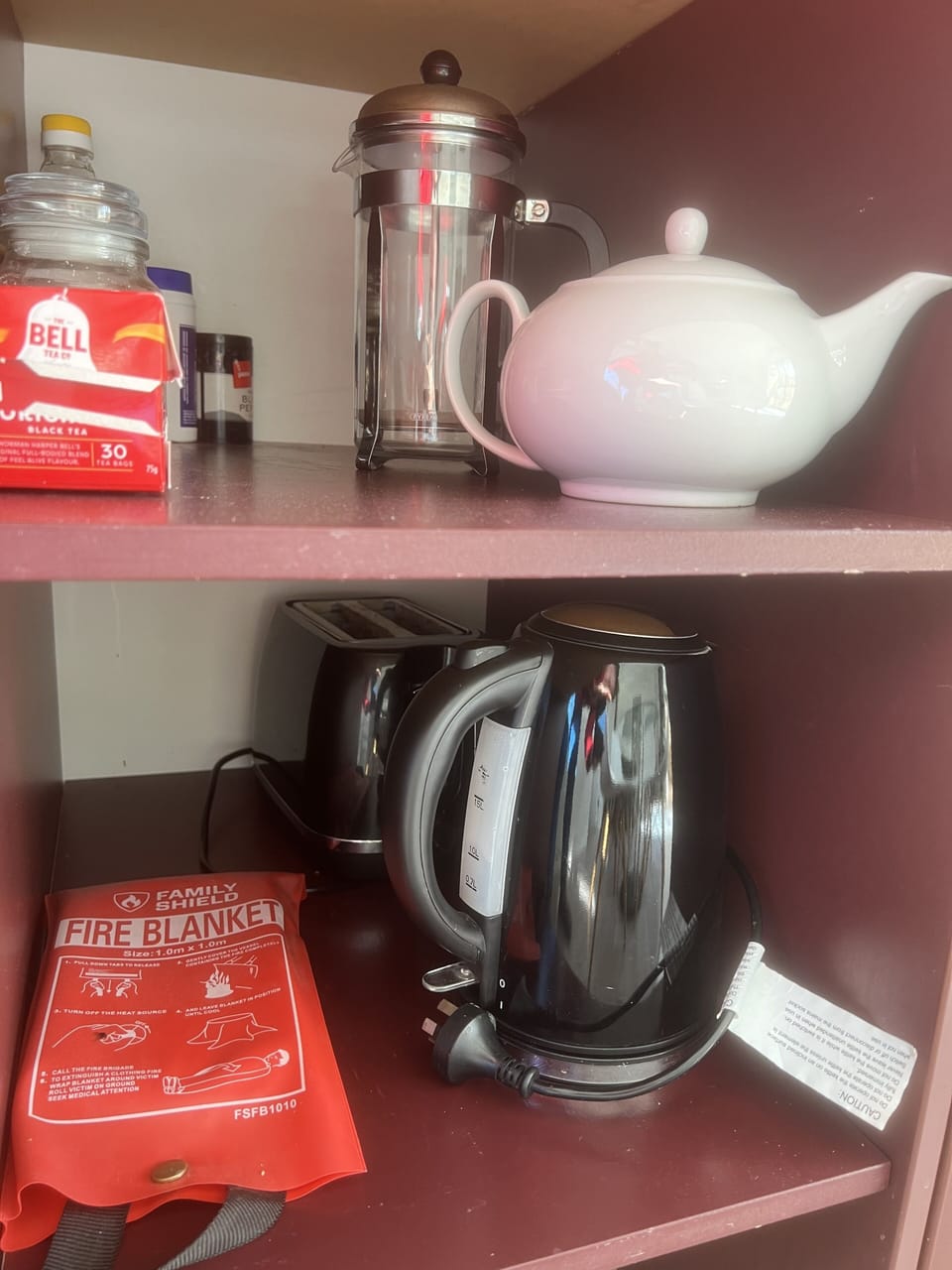 Kettle, toaster, coffee plunger and kettle plus hot drink supplies