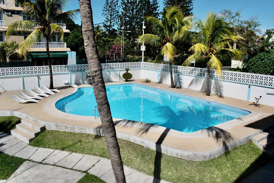 Shared pool - unusually large for a self-catering residence. No lifeguard