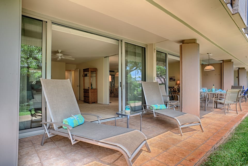 Lanai Seating Area - Shaded lanai with comfortable seating for morning coffee or sunset relaxation.