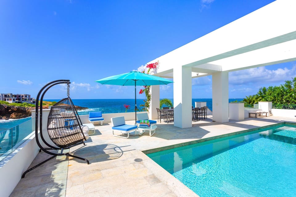 Pool and patio Seating, dining and snack area next to the pool